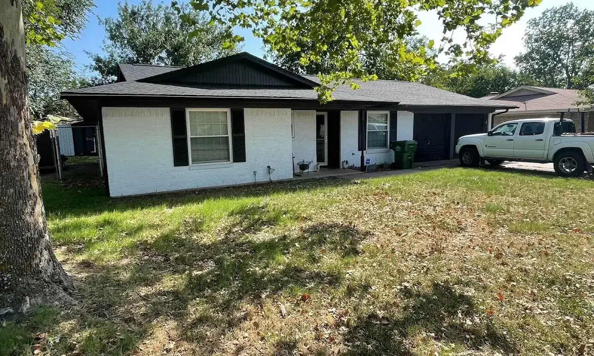 Professional roofing crew working on a residential roof in Rehoboth